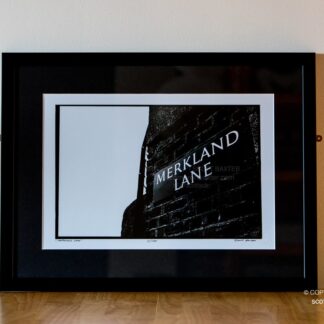 A photograph in black and white is pictured of a limited edition print of Merkland Lane, Pittodrie Stadium. Print is numbered and limited to 100 prints.