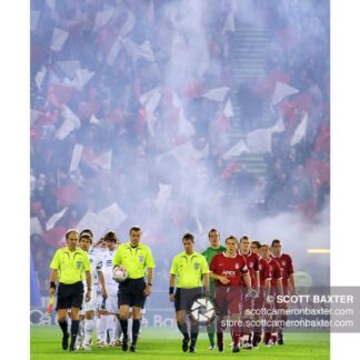 A photograph of players from Aberdeen Football Club and Dnipro walking out to play at Pittodrie Stadium,