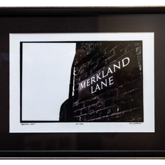 A photograph of a limited edition print of Merkland Lane, Pittodrie Stadium. Print is numbered and limited to 100 prints in a frame.